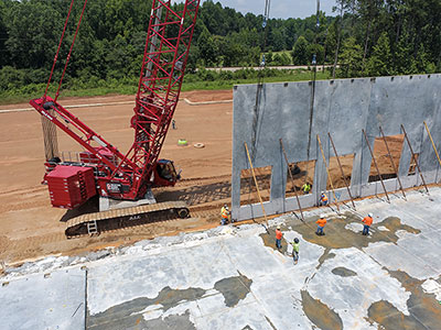 Image of a crane installing walls